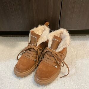 Tan Calvin Klein winter boots in a size 7